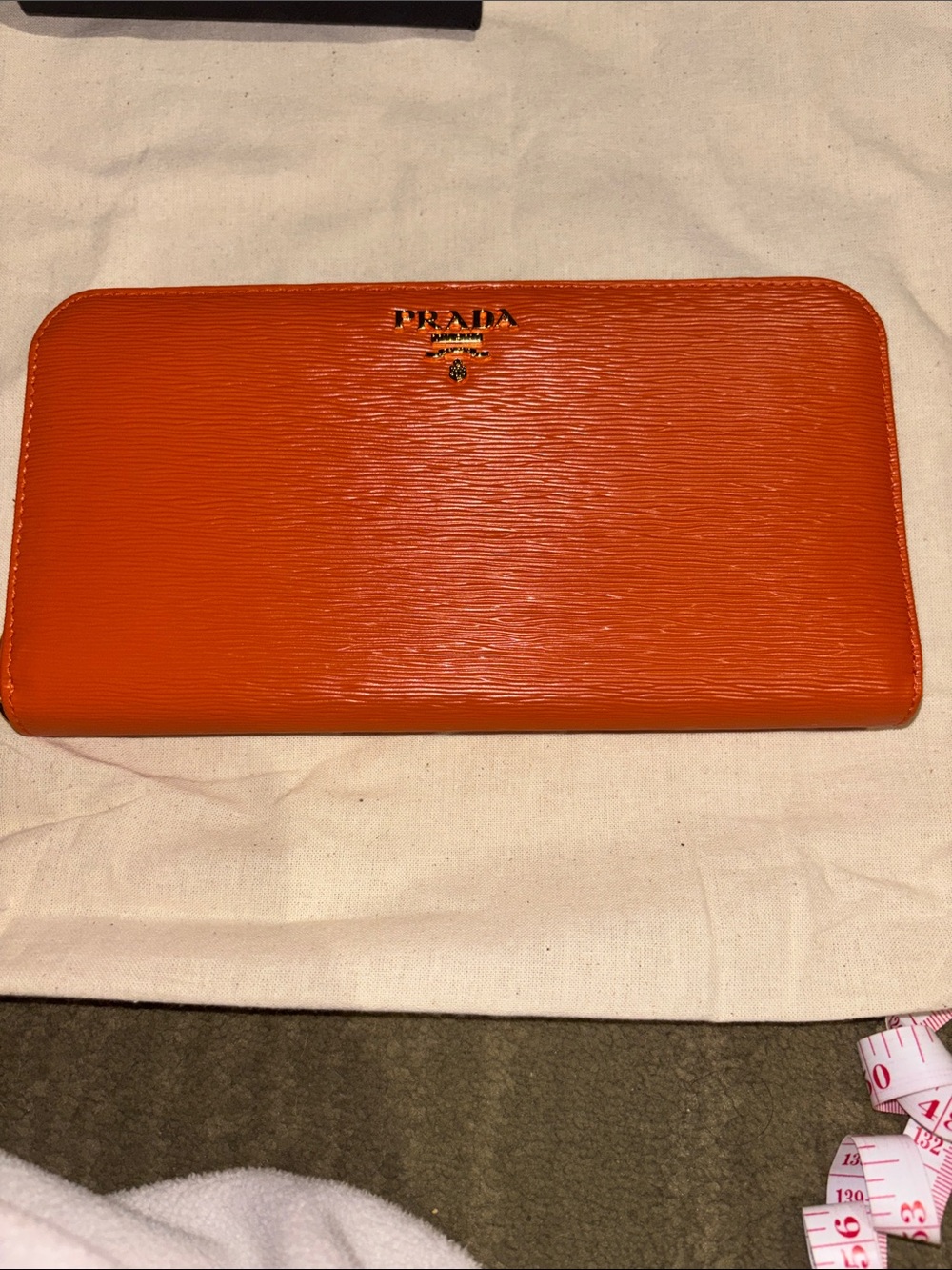 Prada Orange Textured Zip Wallet with Gold Logo